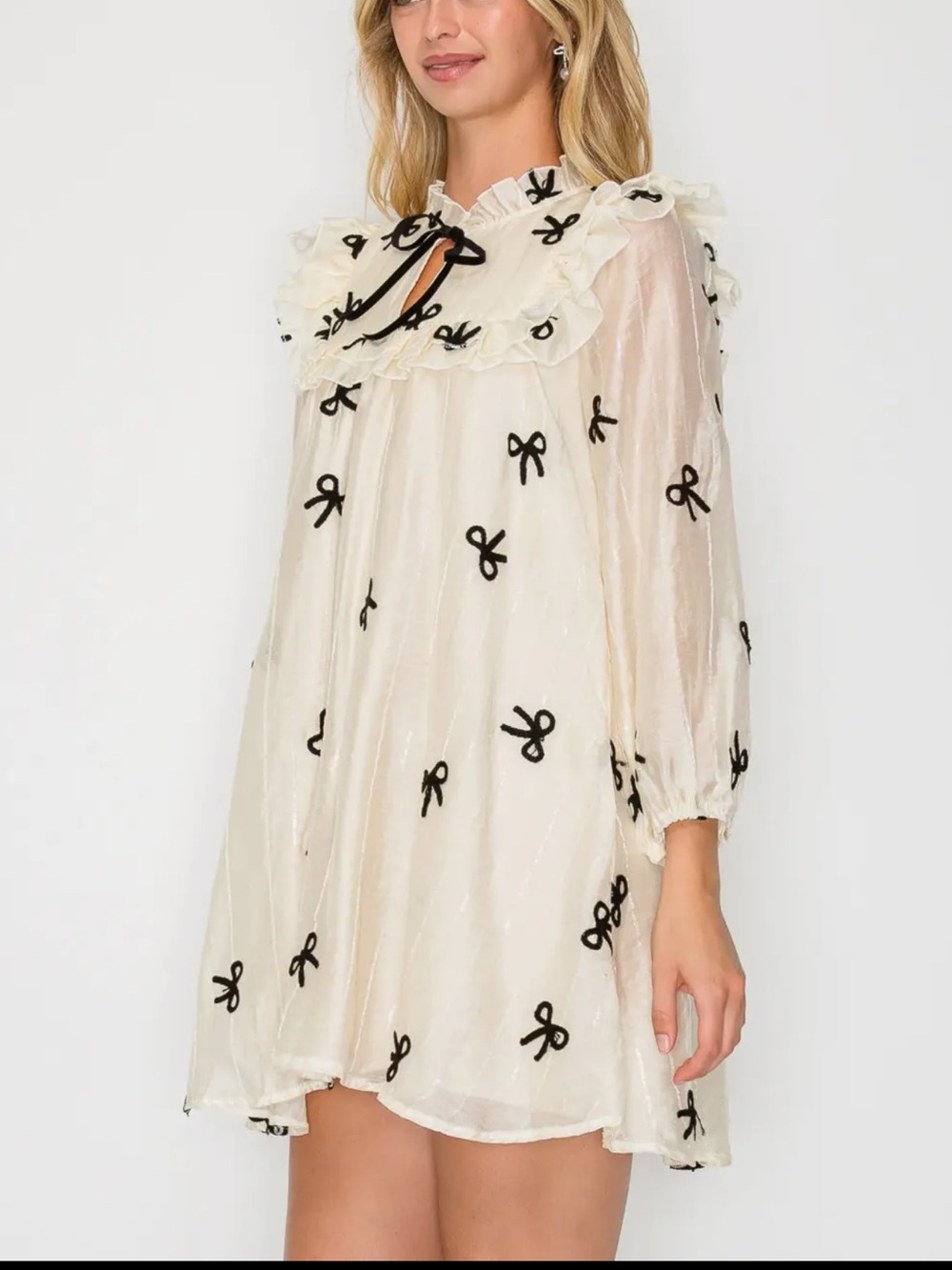 Sheer Ivory Ruffle Mini Dress with Black Bow Appliqués